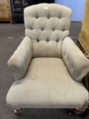 Button upholstered armchair, possibly Howard with turned legs with brass casters marked Cope &