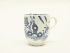 A Lowestoft porcelain coffee cup with the rock and floral pattern, circa 1770