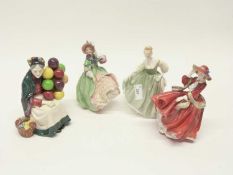 Group of four Doulton figures including The Old Balloon Seller and Top of the Hill