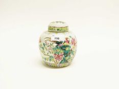 A late 19th Century Chinese porcelain ginger jar and cover decorated in polychrome with birds on