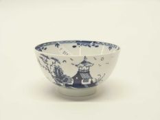 A Lowestoft porcelain slop bowl with pagoda river scene