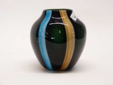 An Art Glass vase, the baluster body with a streaked blue and brown design, 20cm high