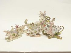 Group of late 19th Century continental porcelain flower holders shaped mainly as chariots with