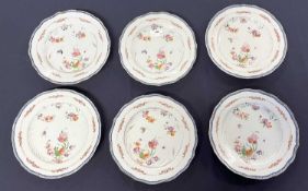 A group of six 18th Century Chinese export porcelain plates with floral designs and bugs within a