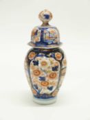 Japanese porcelain vase and cover decorated in Imari style, 25cm high