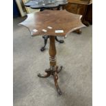 Small late 19th Century wine table with star shaped top over a turned column and tripod base, 73cm