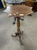 Small late 19th Century wine table with star shaped top over a turned column and tripod base, 73cm
