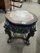 Chinese hardwood and marble inset plant stand set on four tapering legs with ball and claw feet,