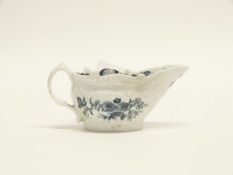 Lowestoft porcelain butter boat, circa 1765 with blue and white two porter landscape pattern