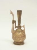 A Royal Worcester Persian influence ewer, the gold ground with scrolling floral design, 29cm high