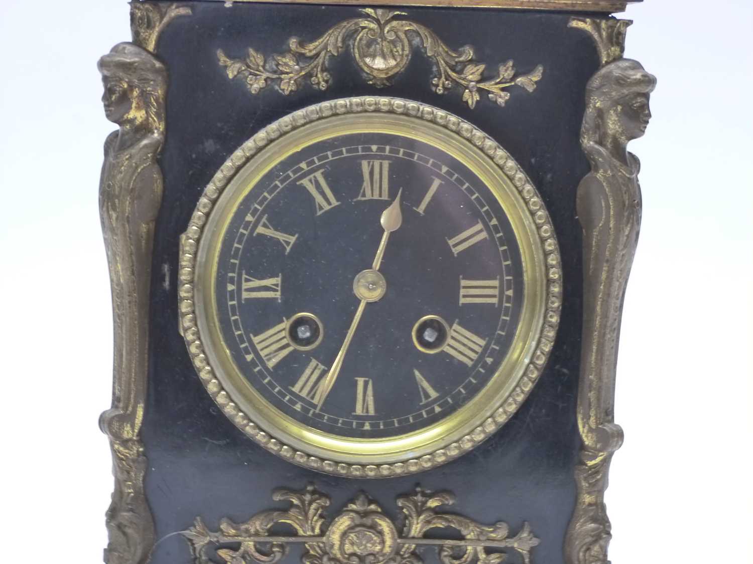 A 19th Century brass mantel clock, black ebonised wood with gilt brass decoration, 23cm high (with - Image 2 of 3