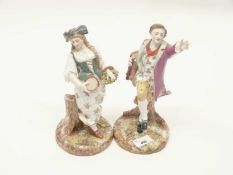 Two Meissen style figures of musicians coloured in Meissen style with impressed numerals to base and