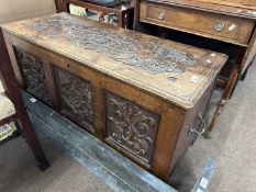 Late 19th Century carved oak coffer with three panelled front, 103cm wide