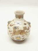 A Satsuma ware vase of baluster form decorated in polychrome and gilt with dragon chasing the