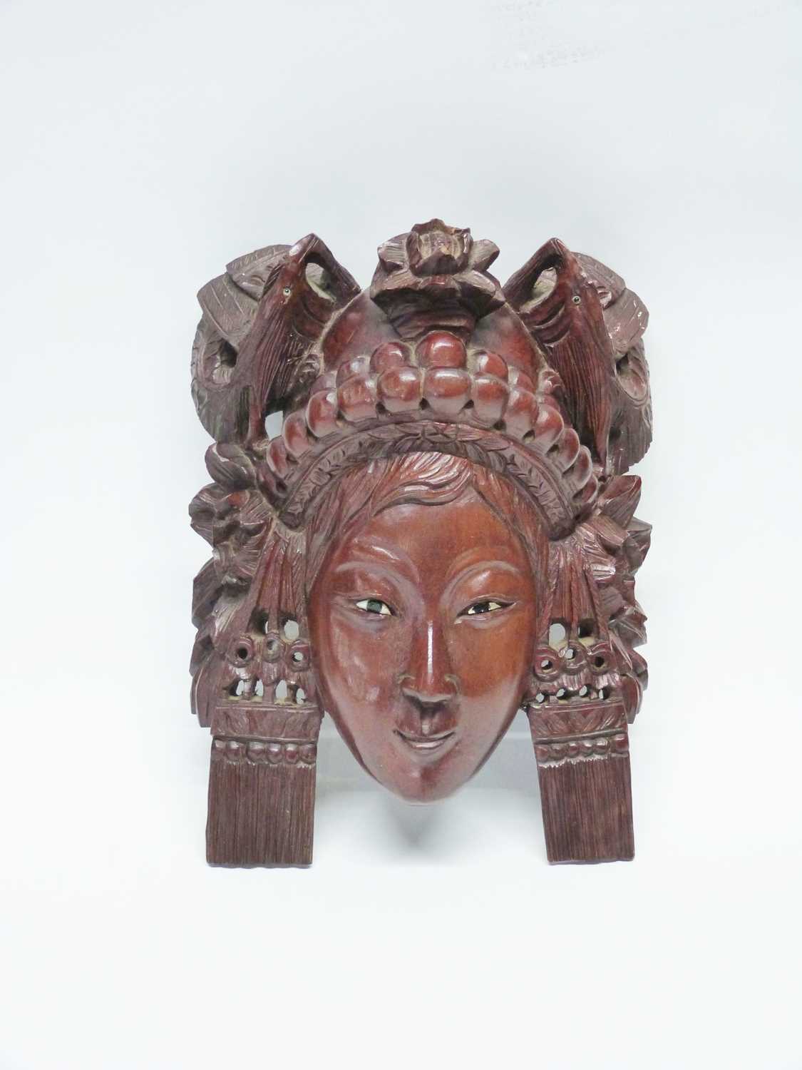 Group of four wooden carved masks, probably Balinese of various deitys - Image 5 of 5