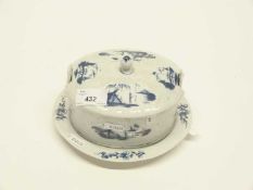 A Lowestoft porcelain Hughes moulded butter tub, cover and stand c.1765 decorated with Chinoiserie