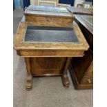 Victorian walnut veneered Davenport desk of typical form, the top section with brass gallery and