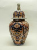 A large Japanese porcelain Imari vase and cover with dog of fo finial, Meiji period, 60cm high