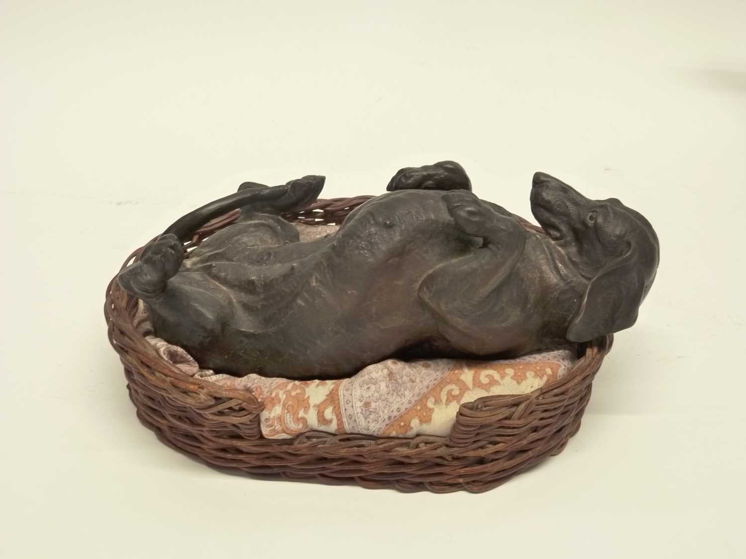 Group of resin models of dogs, one in a basket by Hereditaries Ltd together with a further metal - Image 2 of 5