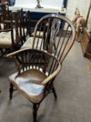 19th Century elm seated Windsor chair with stick back and pierced central splat over turned legs
