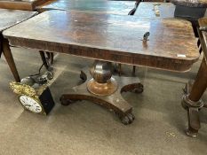 A Victorian rosewood veneered centre table with rectangular top over a bulbous column and four