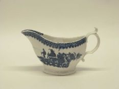 Large 18th Century Caughley sauce boat with blue printed design of the fisherman with angler
