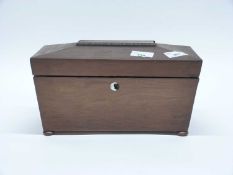 A 19th Century rosewood sarcophagus formed tea caddy with sub-divided interior raised on bun feet,