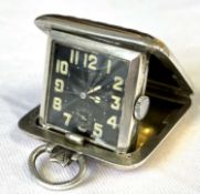 An Art Deco silver and rose gold cased folding purse watch with makers mark for SSM and dated