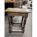 Reproduction oak joint stool raised on turned legs, 45cm wide
