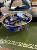 A Carlton ware blue and gilt decorated bowl, 17cm diameter