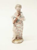 Meissen figure of a child musician, 19th Century, cross swords mark to base, 14cm high