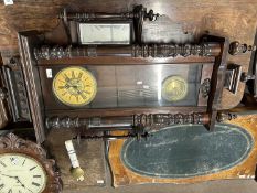 Large late 19th Century Vienna style wall clock set in a mahogany case with detachable pediment