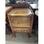 A Georgian mahogany tray top night cupboard with single door over a pull out former commode base,