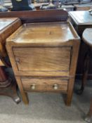 A Georgian mahogany tray top night cupboard with single door over a pull out former commode base,