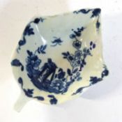 An 18th Century Worcester pickle dish with blue and white bird on the rock design, workmans mark