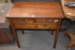 Small Georgian mahogany three drawer side table with brass swan neck handles, 76cm side