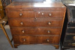 A Victorian mahogany chest of two short over two long drawers raised on bracket feet, 107cm wide