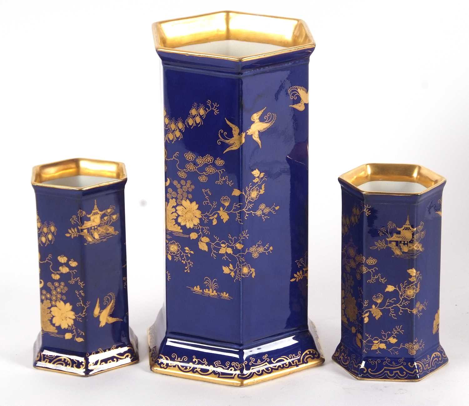 A garniture of Cauldon early 20th Century vases of faceted shape with gilt chinoiserie design - Image 2 of 7