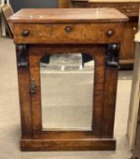 A small Victorian mahogany veneered side cabinet with flip top over a mirrored door, 60cm wide