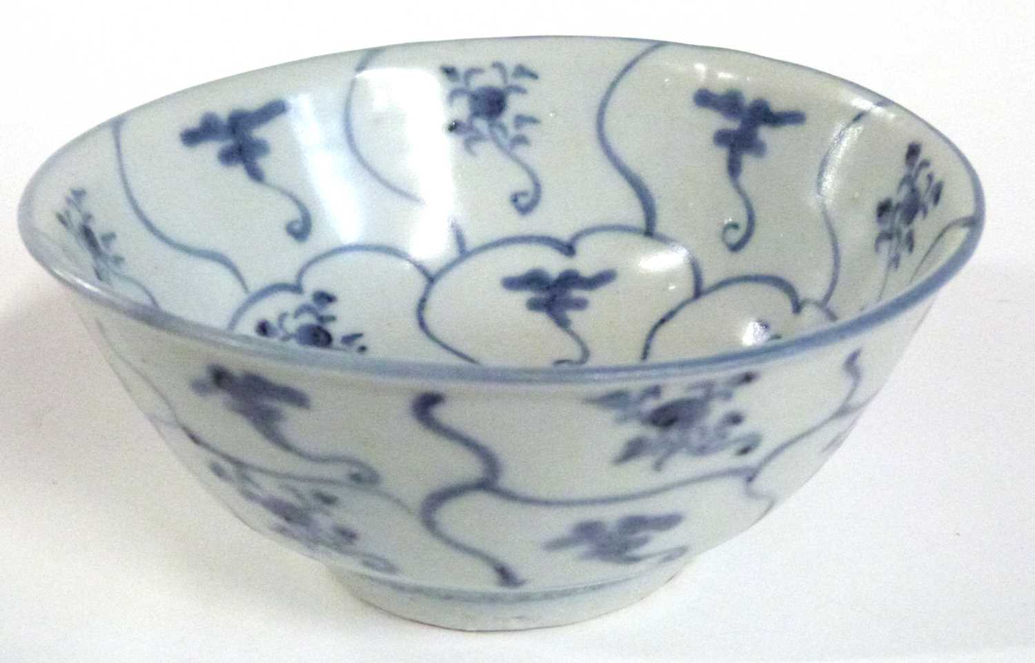 A Chinese porcelain bowl from the Tek Sing sale by Nagel Auctions, with blue and white design, - Image 3 of 8