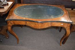 A 19th Century walnut and macquetry inlaid Dutch style writing table with inset oval leather writing