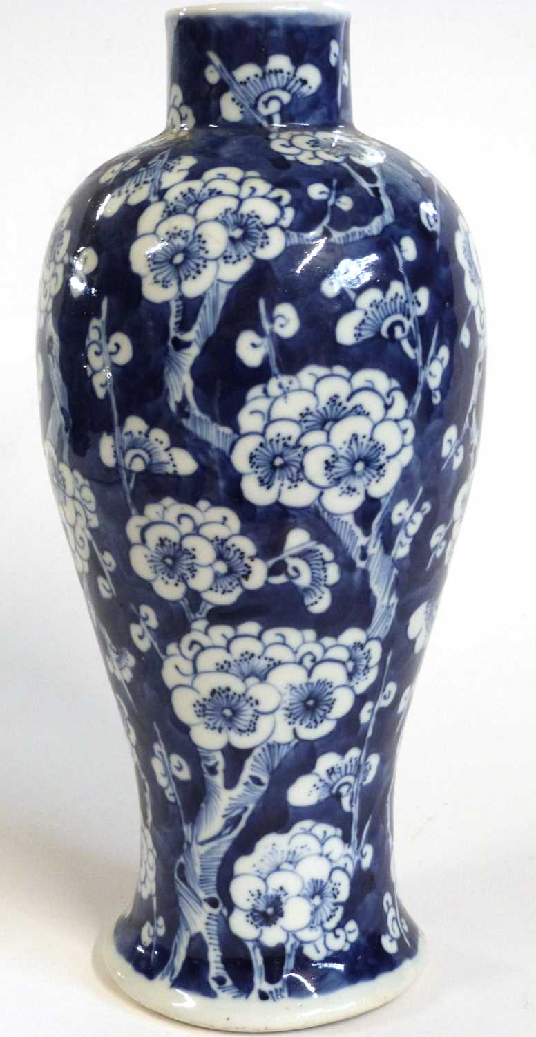 A 19th Century Chinese vase of baluster form, the blue ground with prunus decoration, four character - Image 3 of 5