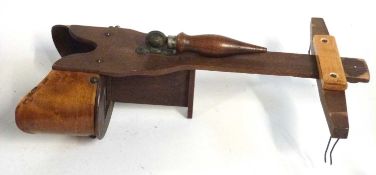 A Holmes stereoscope in birdseye maple circa 1880's in small case