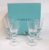 Four Tiffany wine goblets on baluster tear drop stems with original box, 16cm high