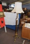 A large brass standard lamp in the Arts and Crafts style - 170 cm high including shade