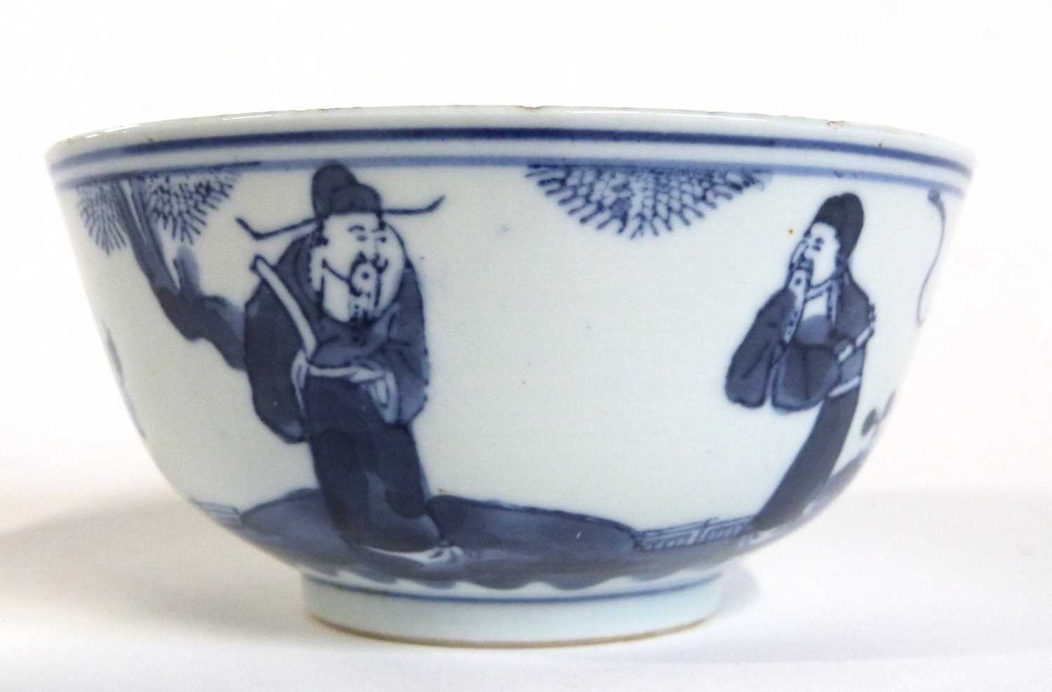 Chinese porcelain bowl decorated with blue and white decoration of Chinese figures (shallow chip