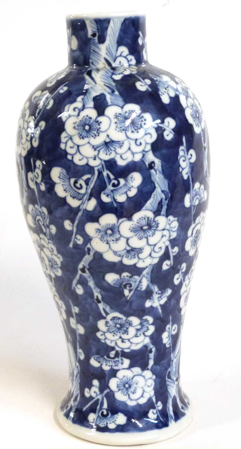 A 19th Century Chinese vase of baluster form, the blue ground with prunus decoration, four character - Image 2 of 5