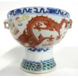 Chinese porcelain stem vase with decoration in iron red of a dragon chasing the flaming pearl