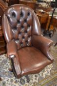 A 20th Century brown leather upholstered revolving and reclining high back office chair, 117cm high