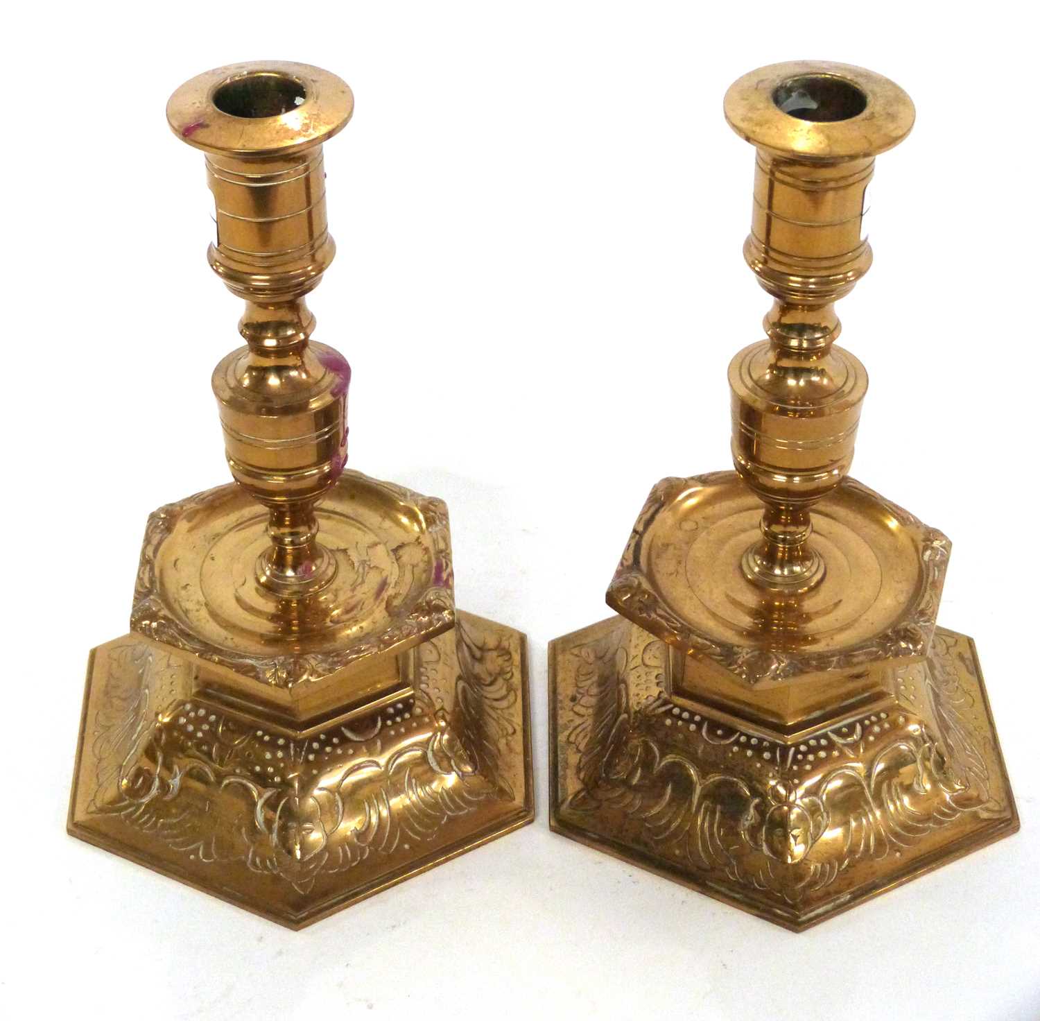 A pair of Swedish Ystad metal brass candlesticks decorated in medieval style, 22cm high - Image 2 of 3